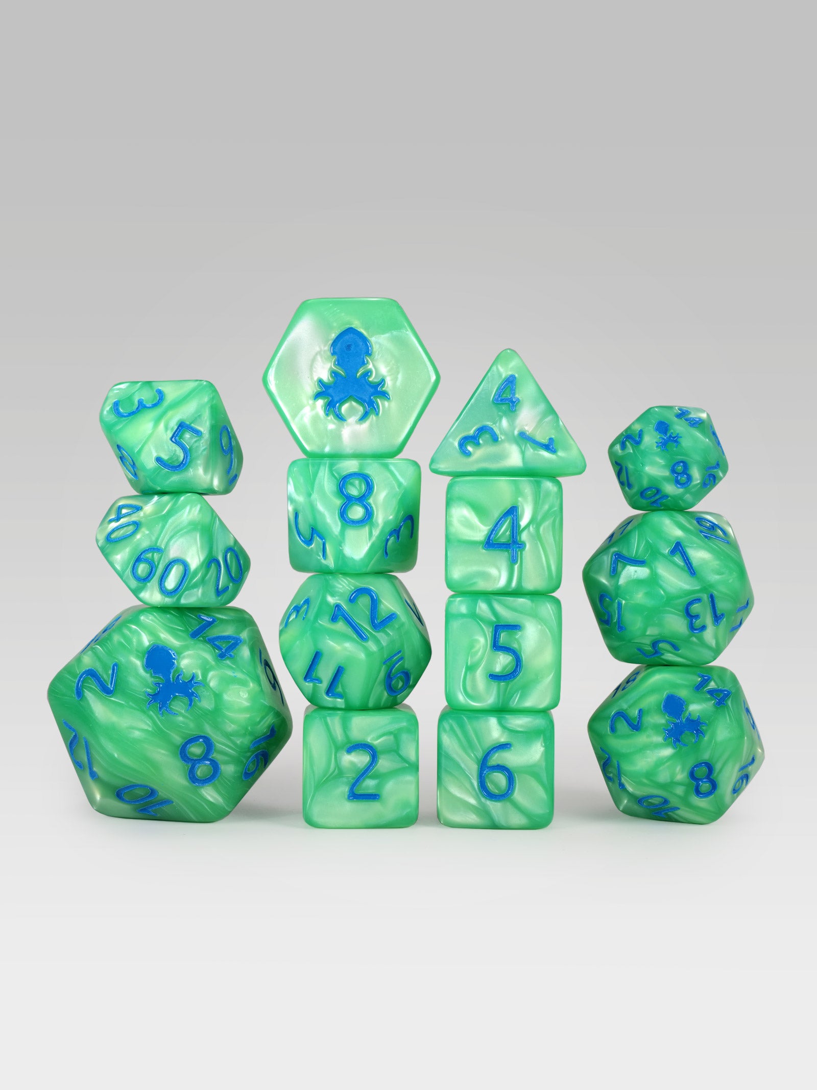 Kraken's Signature Green 14pc Dice Set inked in Blue